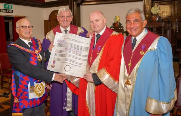 Christopher Clark AMetGS presenting the 100 year Charter